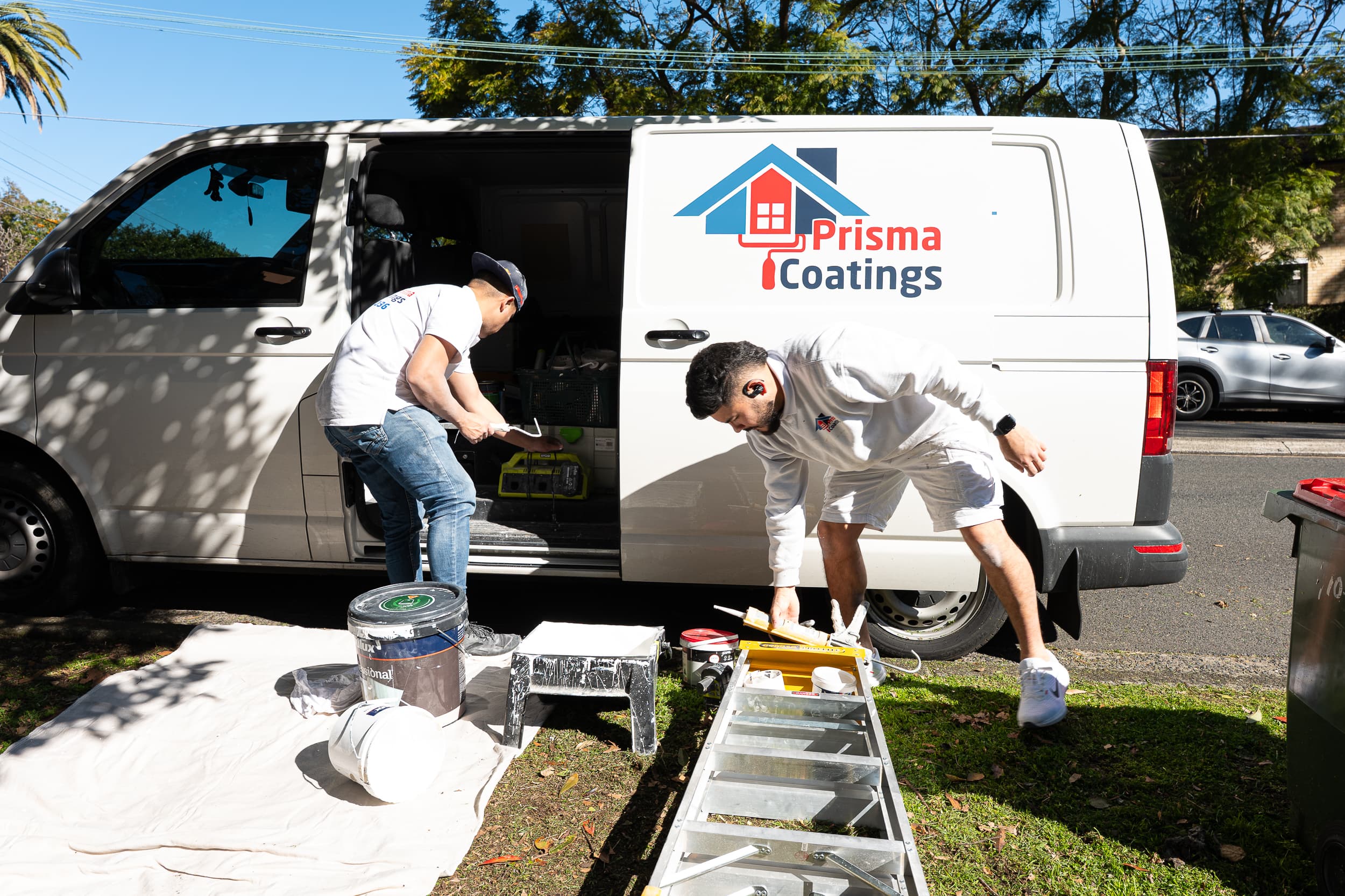 Professional painters in Sydney working on a residential painting project