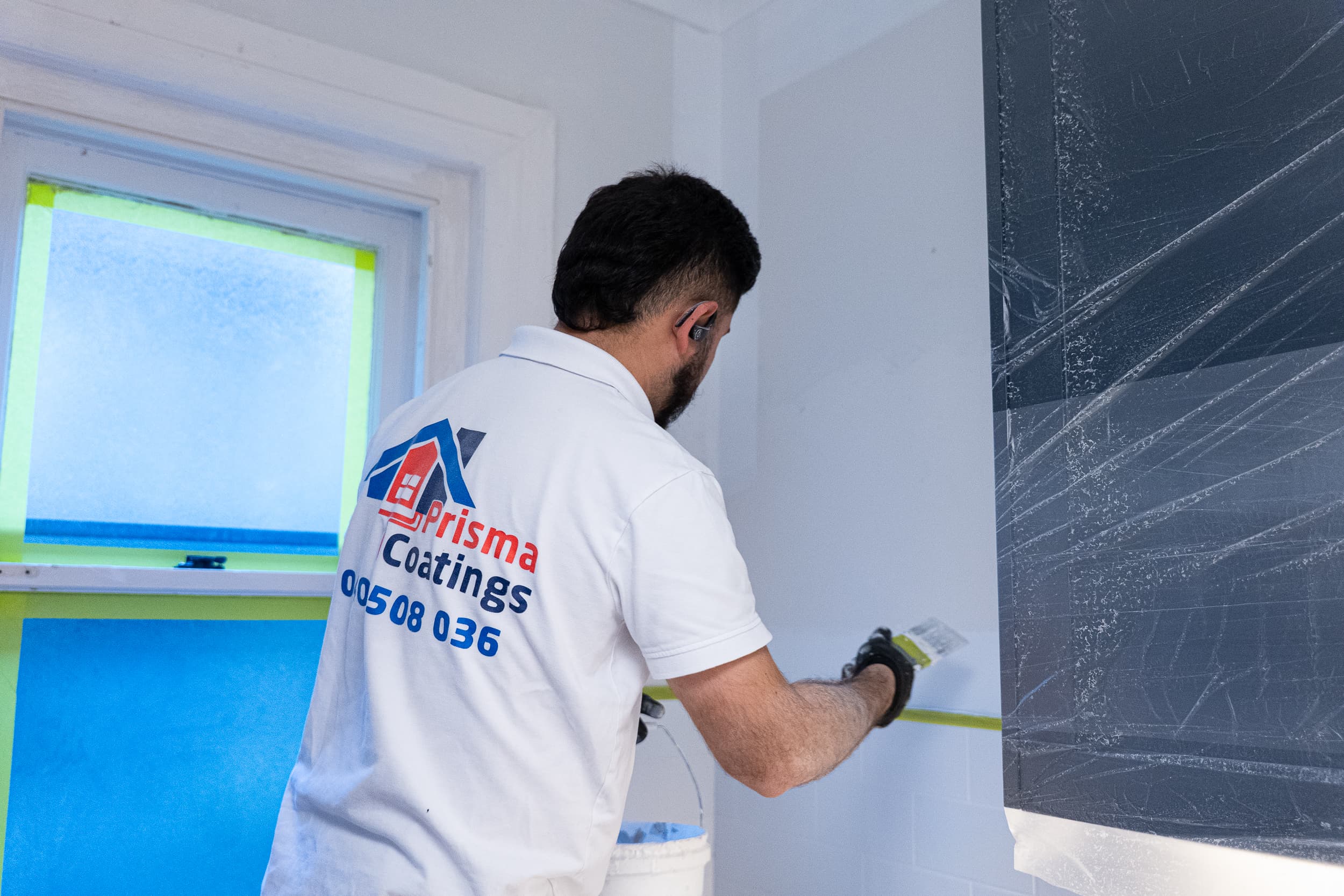 Prisma Coatings logo and branding materials showcasing company identity