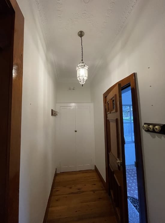 Hallway Interior Painting Sydney - After Interior hallway after professional painting in Sydney with smooth white walls and restored ceiling