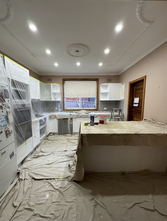 Kitchen Painting Sydney - Before Kitchen before interior painting renovation in Sydney with preparation covers and unfinished walls