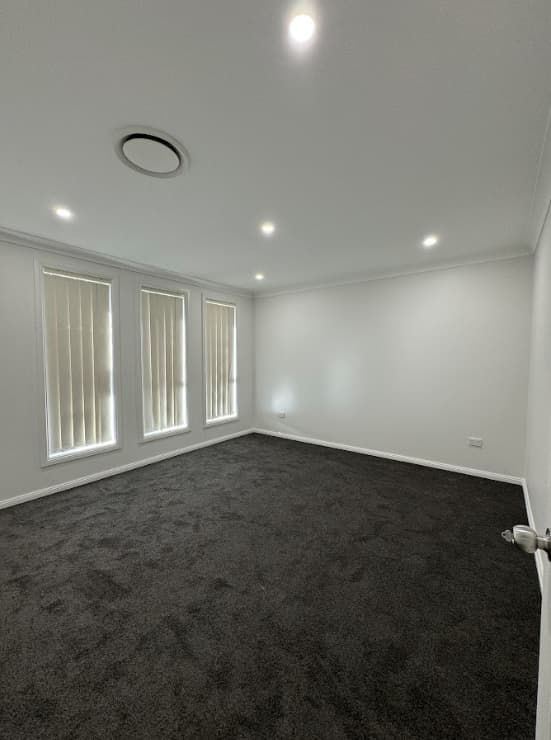 Living Room Painting Sydney - After Living room after professional interior painting in Sydney with smooth white walls and modern finish