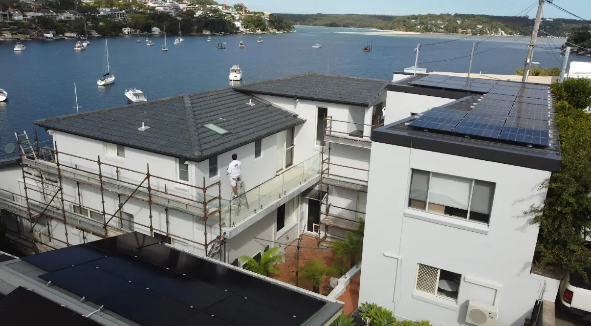 Exterior house painting in Caringbah — durable coating on a brick veneer home